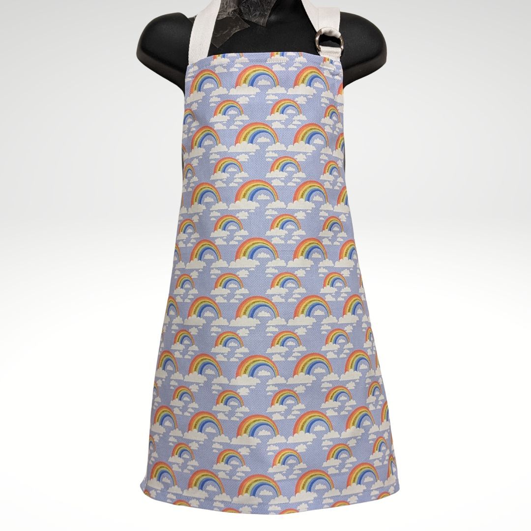 Rainbows on blue child's apron