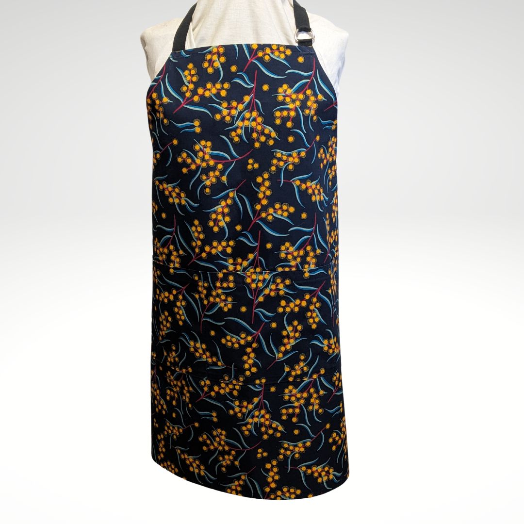 Wattle on navy apron